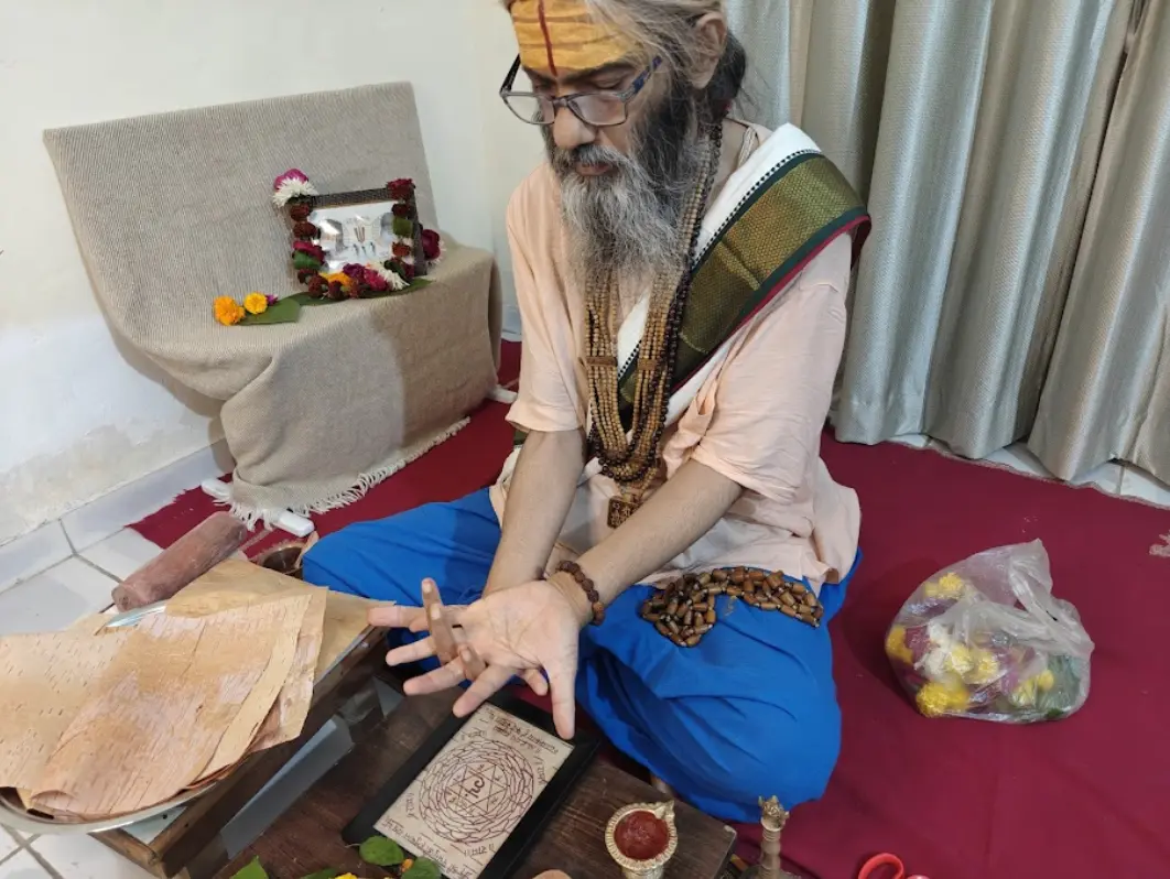 Damodar Das Ji Maharaj performing the Prana Pratishta ritual, a key sacred practice in energizing a Yantra.