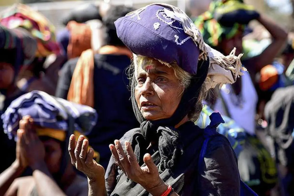 The Women Climbine the 18 Steps of the Ayyappa Sanctum